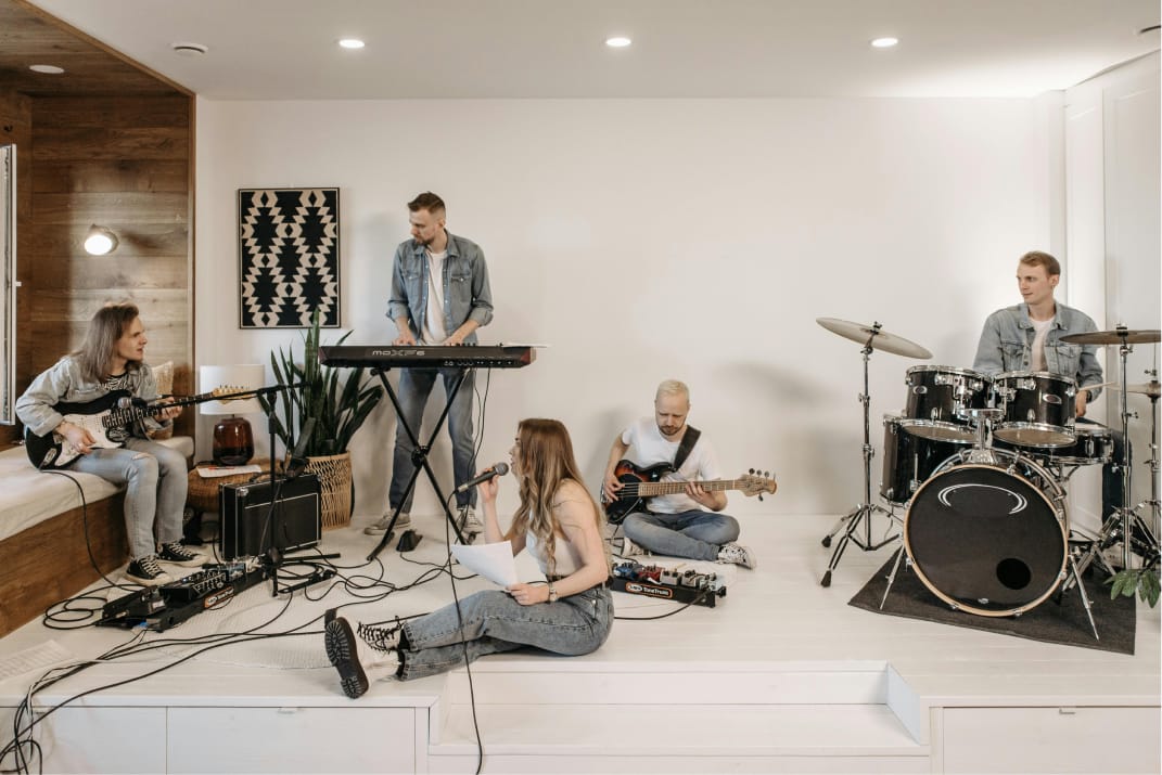 Music band practicing together