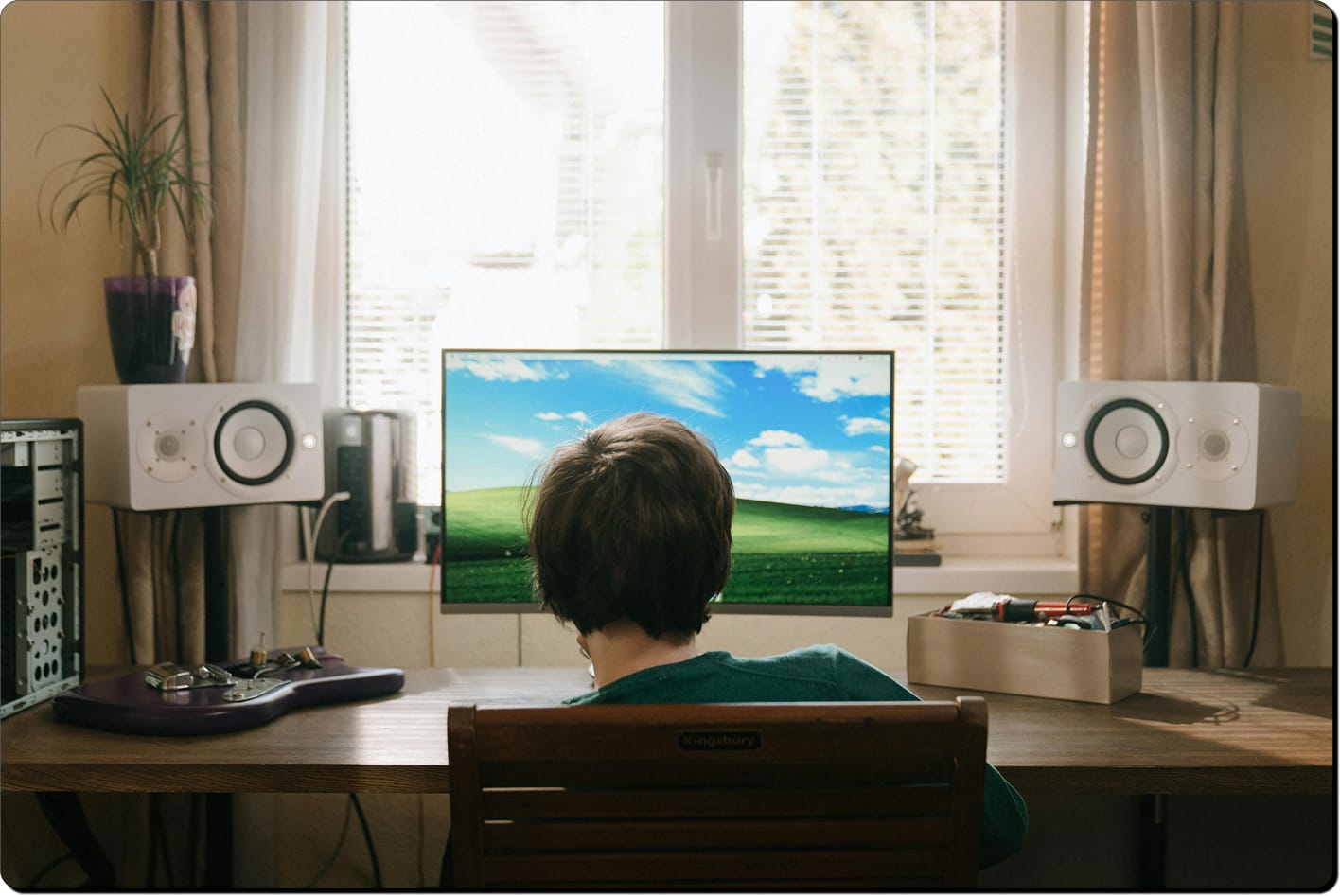 Man standing in front of computer