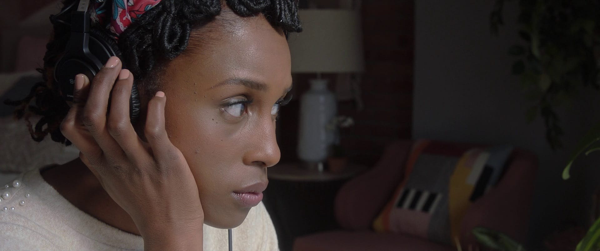 Woman listening to music with headphones